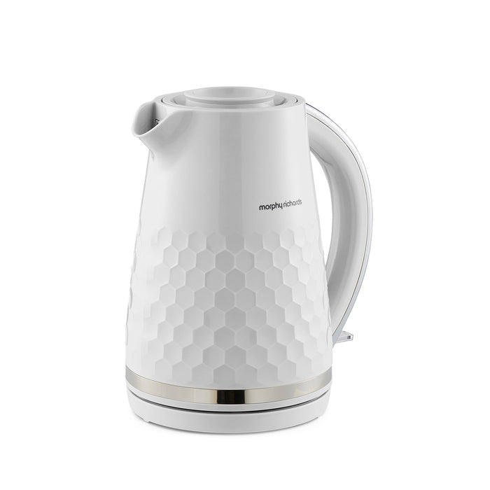White electric kettle with honeycomb pattern on a white background