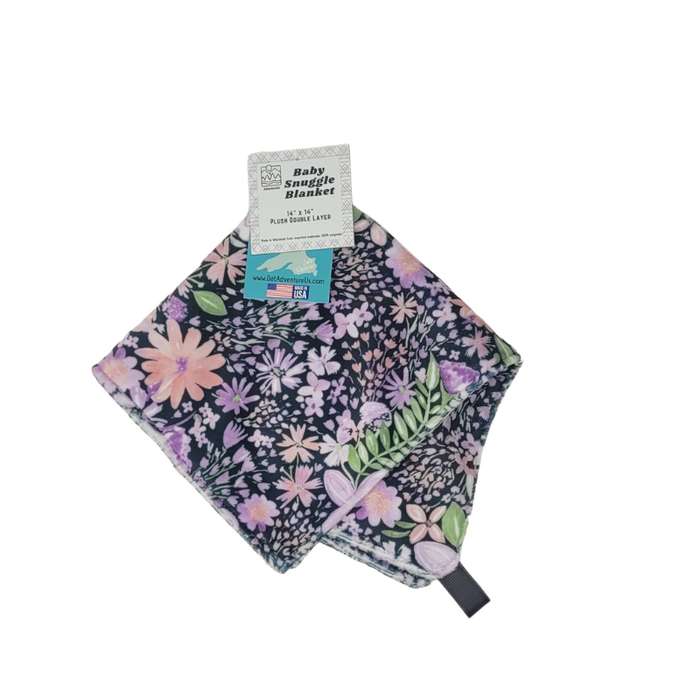 Our Baby Snuggle Blanket is handcrafted in Wisconsin, USA from the softest minky fabric, creating a luxuriously, double-layered comfort lovey that will soothe even the fussiest baby. A truly special item, perfect for snuggling and gifting. Lux micro minky in a compact size for snuggles on the go. Add it to your diaper bag for easy soothing on all of your adventures. Polyester tag loop is perfect for securing to car seats and stroller as well as an additional sensory experience