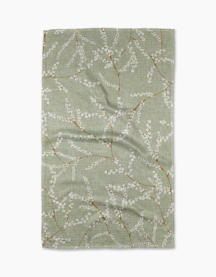 Fabric with floral pattern on a green background