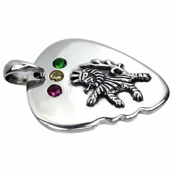 A side view of the two-tone Rasta lion pendant, highlighting the detailed lion carving.