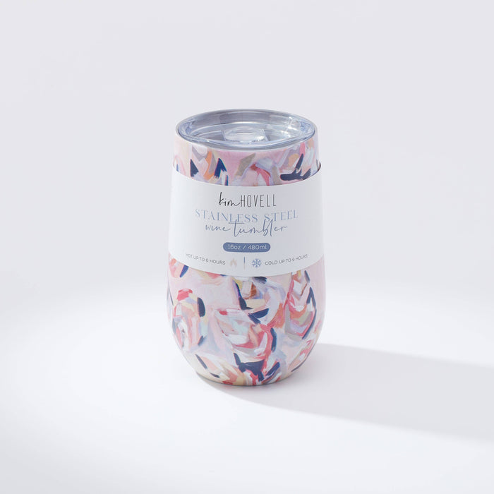 Tumbler with pink oyster pattern against white background
