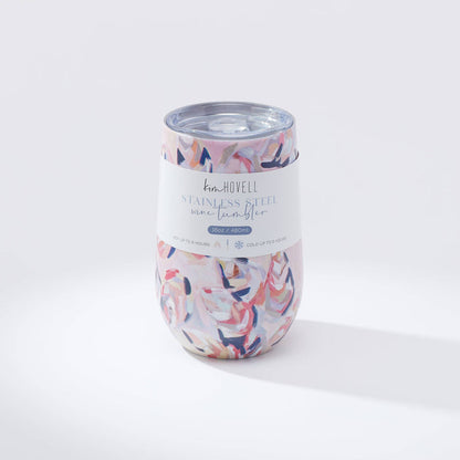 Tumbler with pink oyster pattern against white background