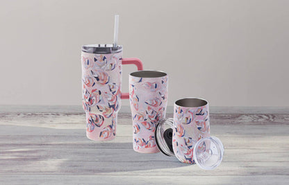 Tumblers with pink oyster pattern against gray background