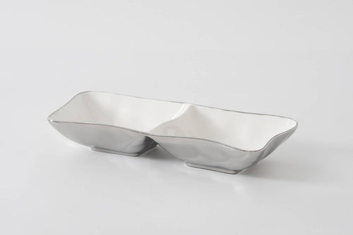 Silver bowl with a unique design on a white background