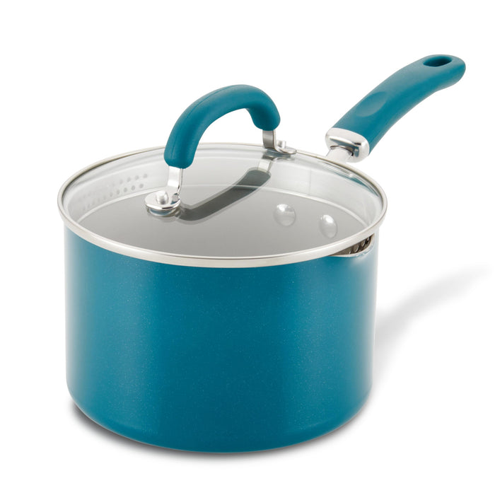 Teal 3-Quart Nonstick Induction Straining Saucepan with glass lid and handle.