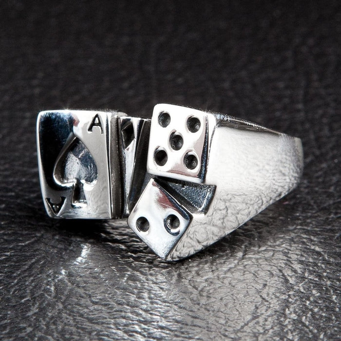 Close-up side view of ace of spades sterling silver ring showing carved dice with pip details
