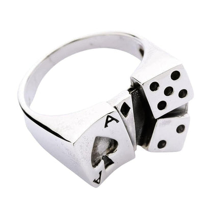 Profile view of handmade casino themed sterling silver ring with ace and dice carvings