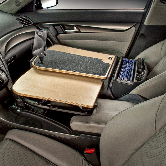 The AutoExec GripMaster Car Desk with Mega Grip™ Drill-Base Mount is installed over the passenger seat, transforming it into a mobile office workstation with a phone holder and organizer.
