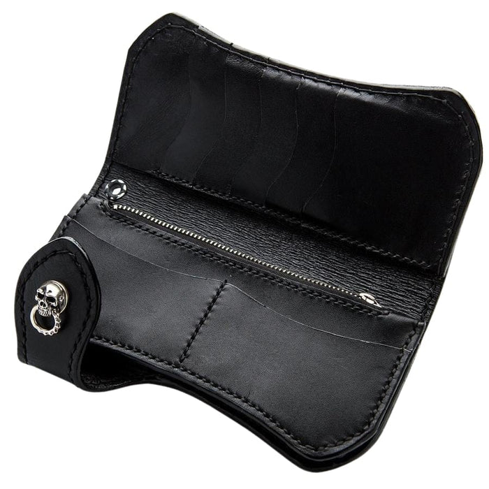 The black leather interior of a classic biker wallet, showing its multiple card slots and secure zip compartment.