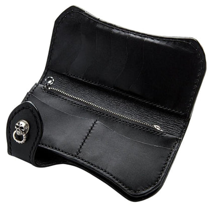 The black leather interior of a classic biker wallet, showing its multiple card slots and secure zip compartment.