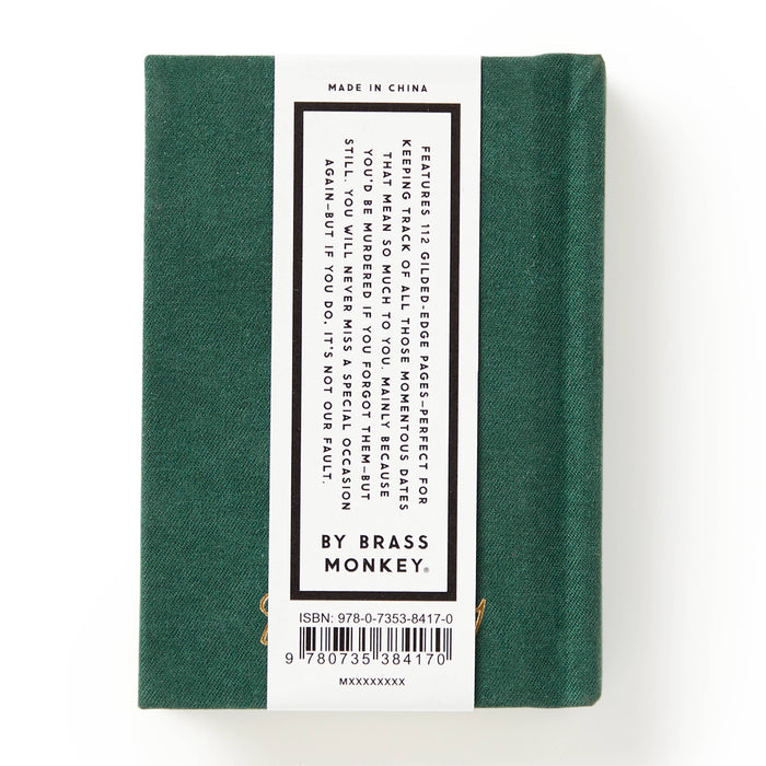 Green book with a label on a white background