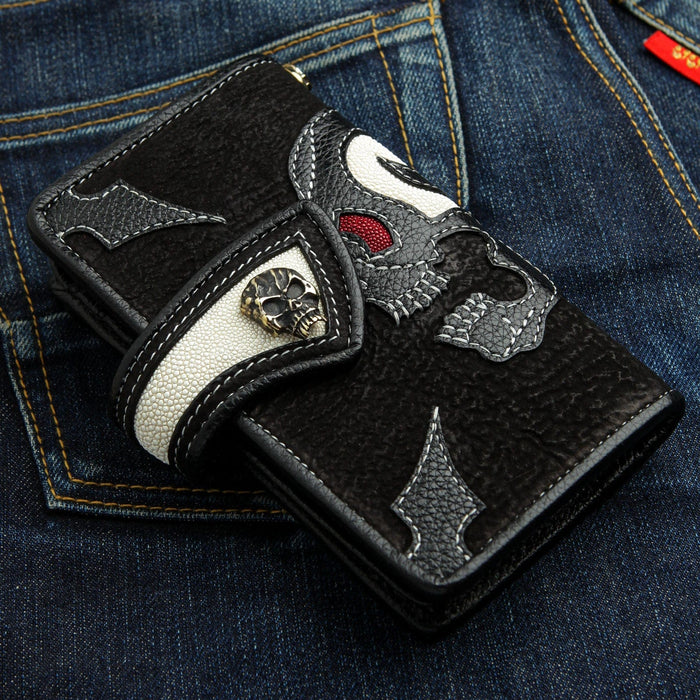 A black leather biker wallet with a red stingray accent.