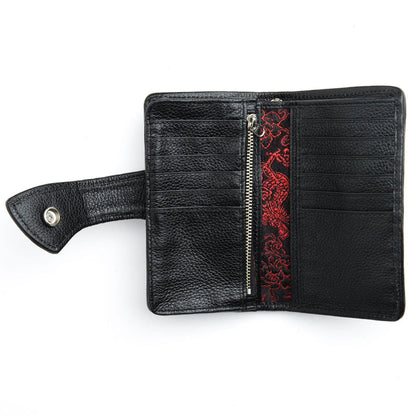 The spacious interior of a black leather custom biker wallet, with 12 card slots and multiple large compartments.