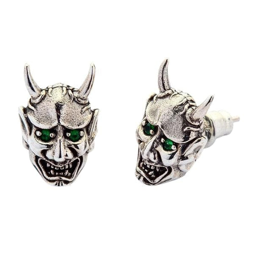 A front and side view of the Hannya mask style earrings with green eyes, isolated on a white background.
