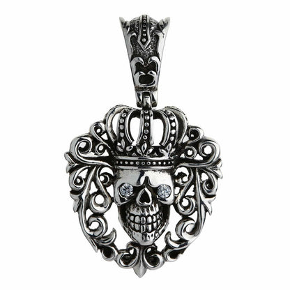 Front view of the .925 sterling silver crown skull pendant, clear CZ eyes set inside a heart-shaped scroll frame