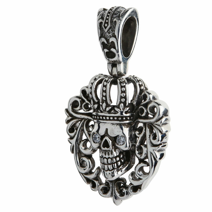 Three-quarter angle showing the pendant's 4mm depth and the hollow interior of the engraved fleur-de-lis bail