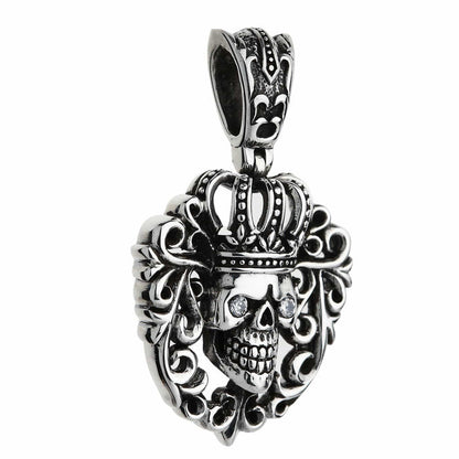 Fleur-de-lis engraving on the tapered bail, with the crowned skull and openwork scrollwork below in raised relief