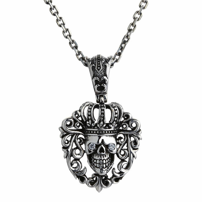 Hanging straight on a sterling silver cable chain (sold separately), the crowned skull pendant faces forward