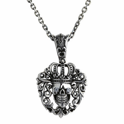 Hanging straight on a sterling silver cable chain (sold separately), the crowned skull pendant faces forward