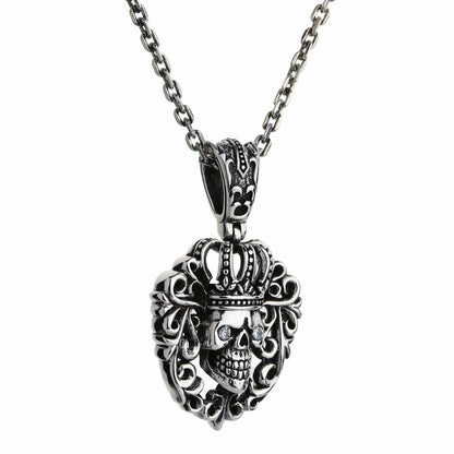 Angled shot on a chain shows the 22-gram pendant hanging straight, its scroll frame catching studio light