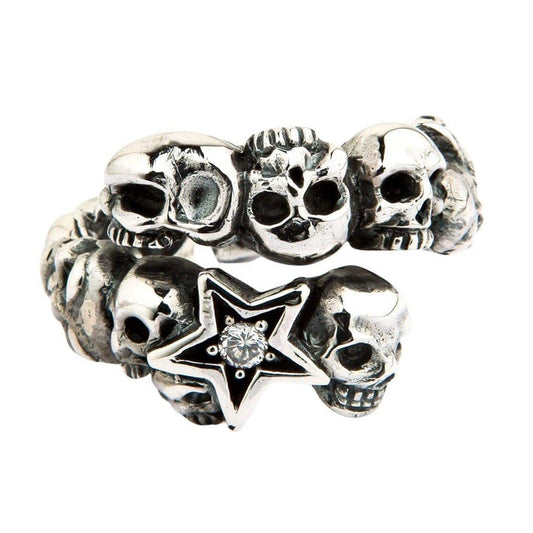 Frontal studio shot of the .925 silver wrap band displaying the tiered skull design and faceted stone star centerpiece.
