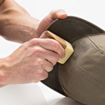 Otter Wax Fabric Wax can be used to revive the waterproofing capabilities of factory-waxed or oiled clothing, and is also an excellent way to waterproof untreated fabrics. All-natural heavy duty fabric wax is made from the highest quality beeswax and proprietary blend of plant-based waxes and oils.
