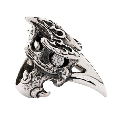 A side profile of the sterling silver Viking raven ring, showing its openwork, bone-like design.