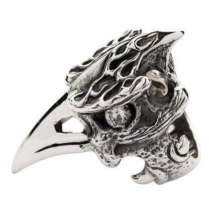 An angled view of the gothic bird skull ring, highlighting the clear diamond CZ stone eye and fire details.