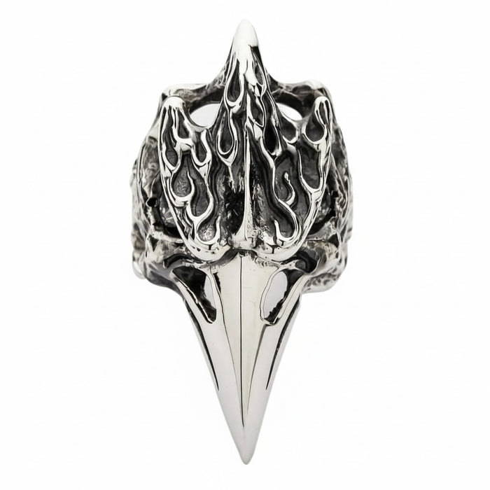 A front view of the heavy sterling silver fire raven skull ring with a long polished beak.