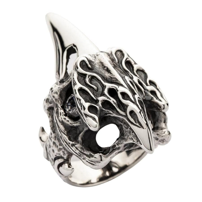 A detailed close-up of the top head raven skull ring, focusing on the flame and bone textures.