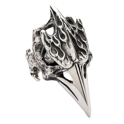 A front-on shot of the handmade fire raven skull ring, isolated on a white background.
