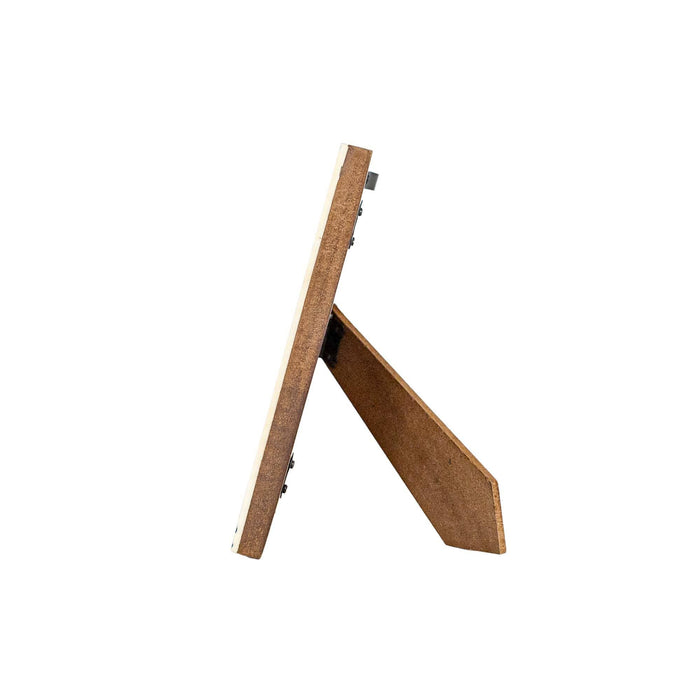side view of wooden frame against a white background