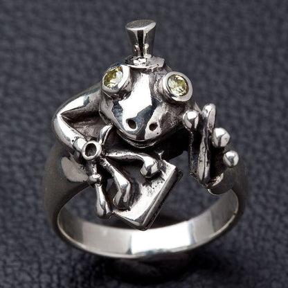 Front view of whimsical frog gentleman ring in polished sterling silver