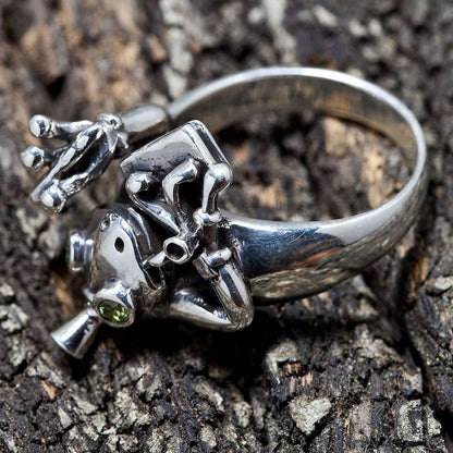 Profile view of solid silver frog ring showing band thickness and craftsmanship