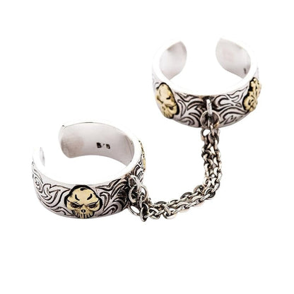 A flat layout of the adjustable double ring, showing the full length of the connecting chain.
