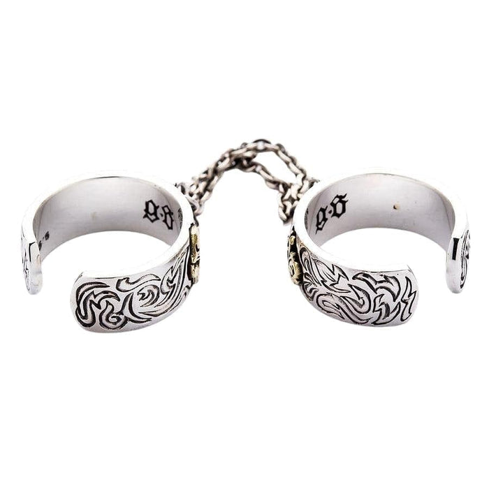 The back of the chained skull rings, showing the adjustable open bands.