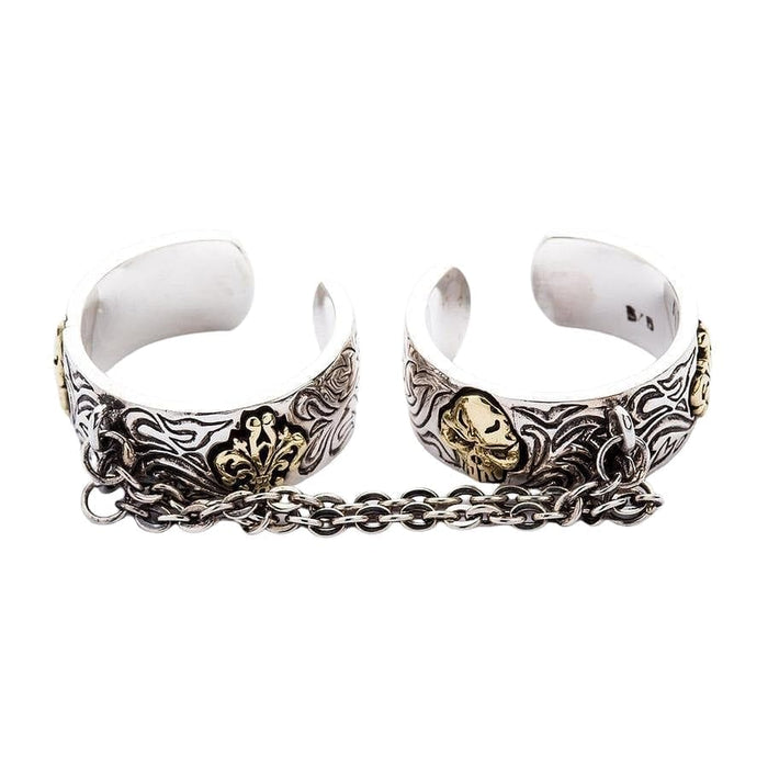 A side profile of the gothic two finger ring, showing the open cuff design.