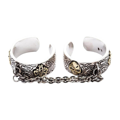 A side profile of the gothic two finger ring, showing the open cuff design.