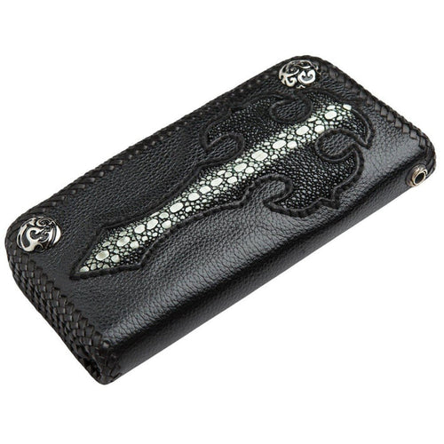 Black leather wallet with a flush-inlaid stingray skin cross, braided edges, and silver corner accents.