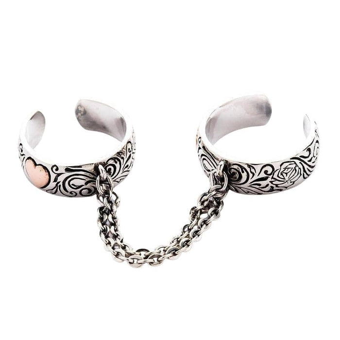 A side profile of the punk two finger promise ring, showing the open cuff design.
