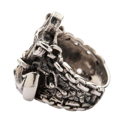 The other side of the handcrafted nautical anchor ring, showing its rugged texture.