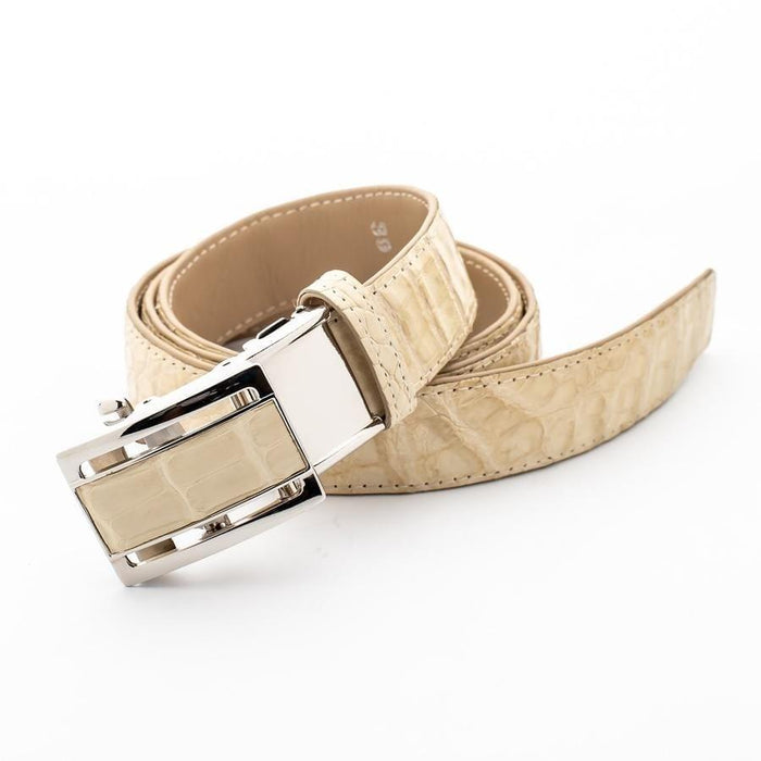 Diagonal view of the coiled cream crocodile belt, highlighting the silver inlay buckle and inner size 38 stamp.