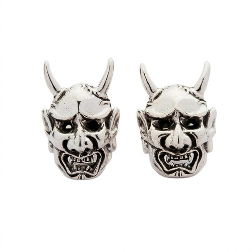 Pair of .925 sterling silver stud earrings shaped like Japanese Oni demon masks featuring curled horns and snarling mouths.