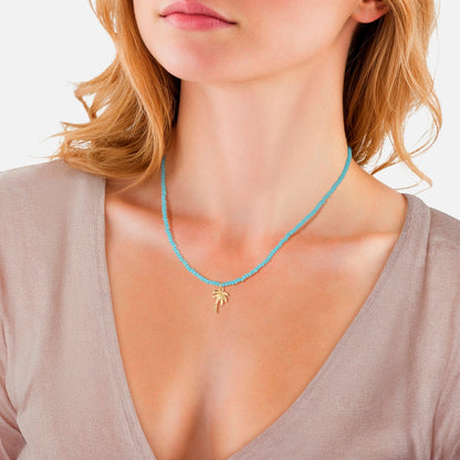 Kette mit blauen Glasperlen und Palmen-Anhänger