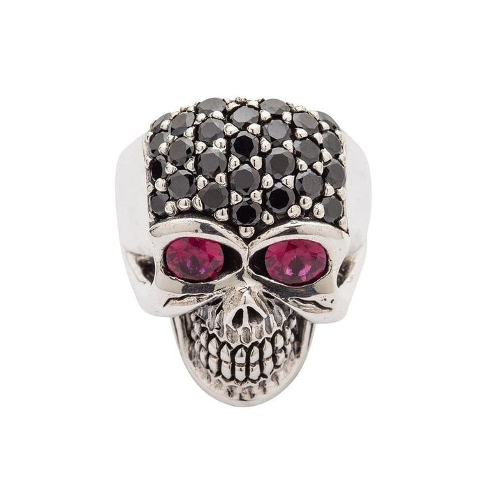 A sterling silver lady skull ring with a cranium completely paved in black crystals and two large, deep red stone eyes.