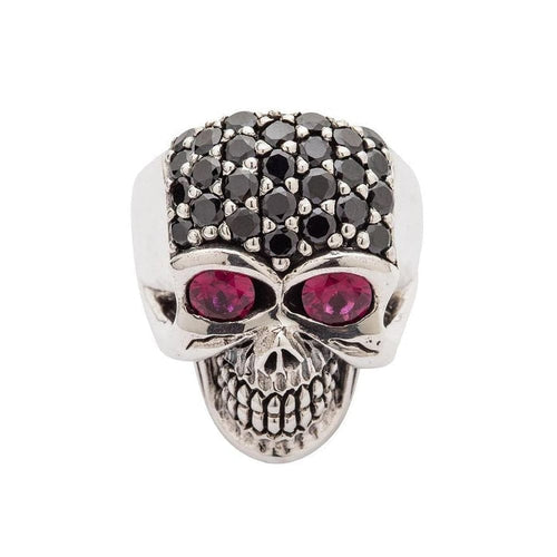 A sterling silver lady skull ring with a cranium completely paved in black crystals and two large, deep red stone eyes.