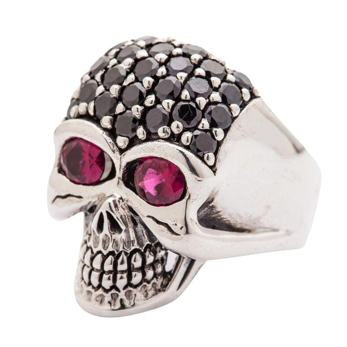 A premium black jeweled skull ring for women, a unique and powerful piece of gothic jewelry.