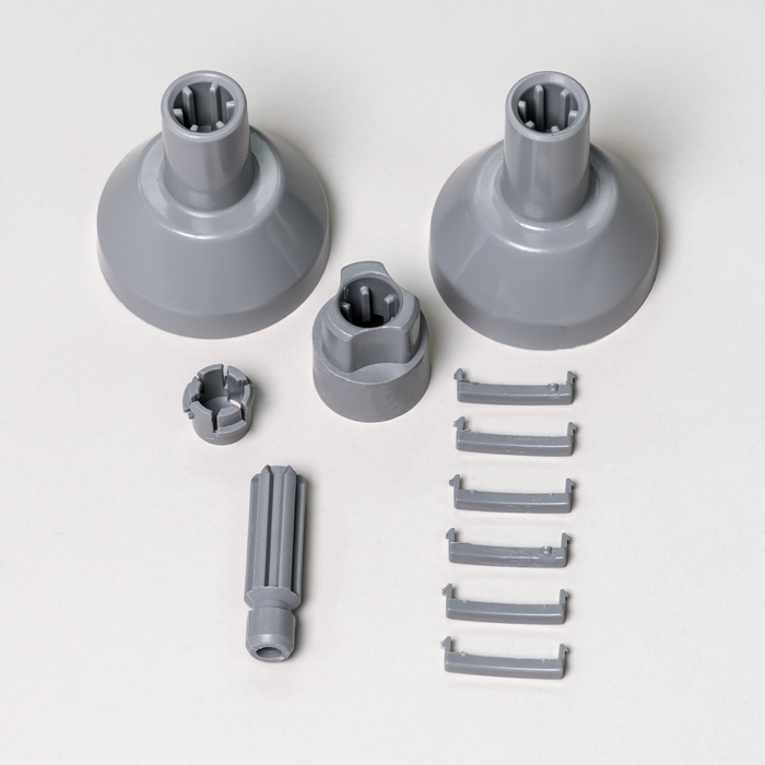 11-piece parts pack for the NutriMill large slicer shredder on a grey background