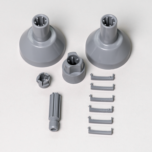 11-piece parts pack for the NutriMill large slicer shredder on a grey background