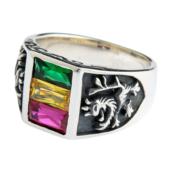 A close-up side view of the ring, showing the intricate carving of the Lion of Judah in sterling silver against a dark background.